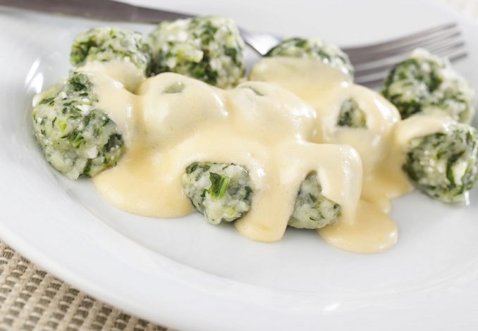 Portion of lasagne with bolognese and cheese